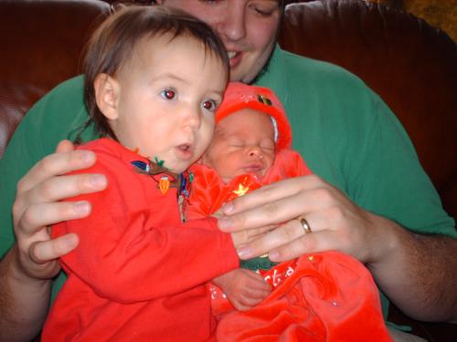 Tyler tolerating Gracie's hugs