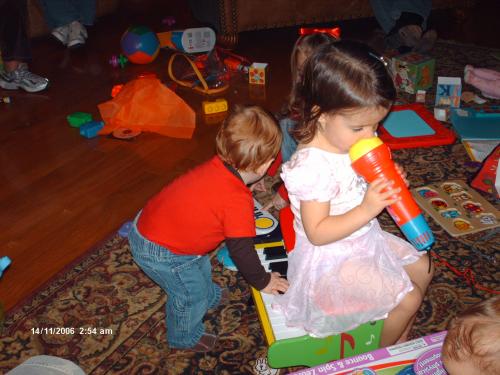 Toren playing the piano for Gracie