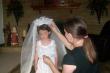Mom pins the veil